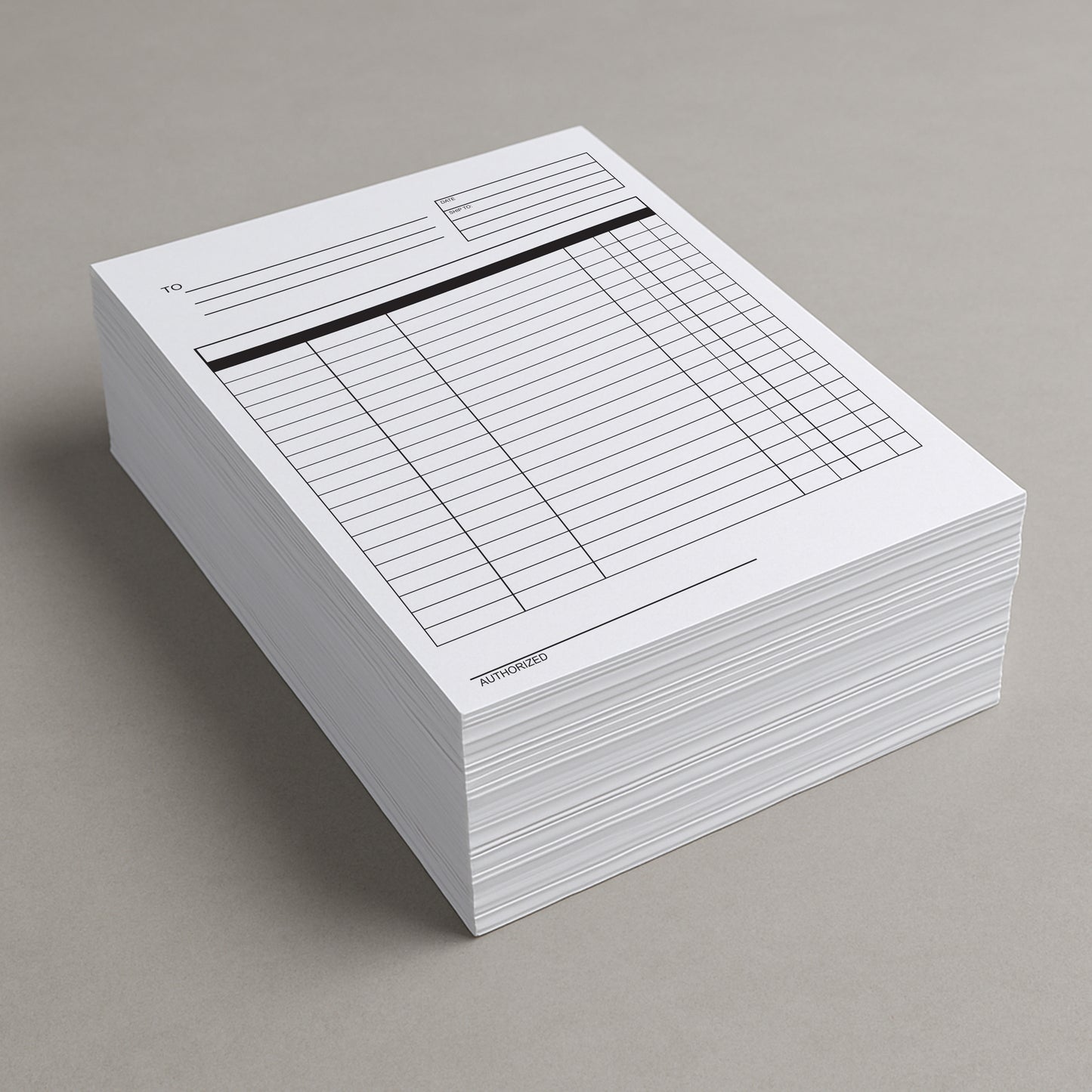 Stack of pre-printed forms on a gray background
